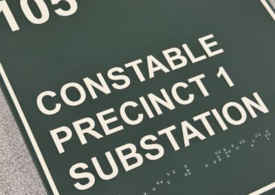 Green ADA Room Sign with Braille